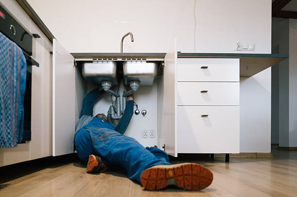 Professional Emergency Plumber technician working in Chesterhill, OH